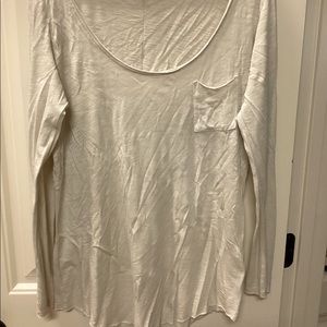 Loose fitting pocket tee.